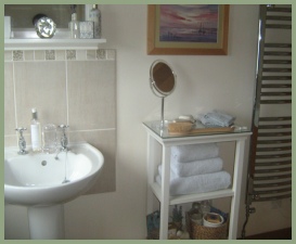 Upstairs bathroom next to double bedroom at Meadow Barn