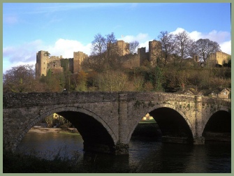 Dinham Bridge and Ludlow Castle, both at Ludlow, a short drive from Meadow Barn