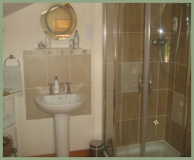 Ensuite shower room off king-size bedroom